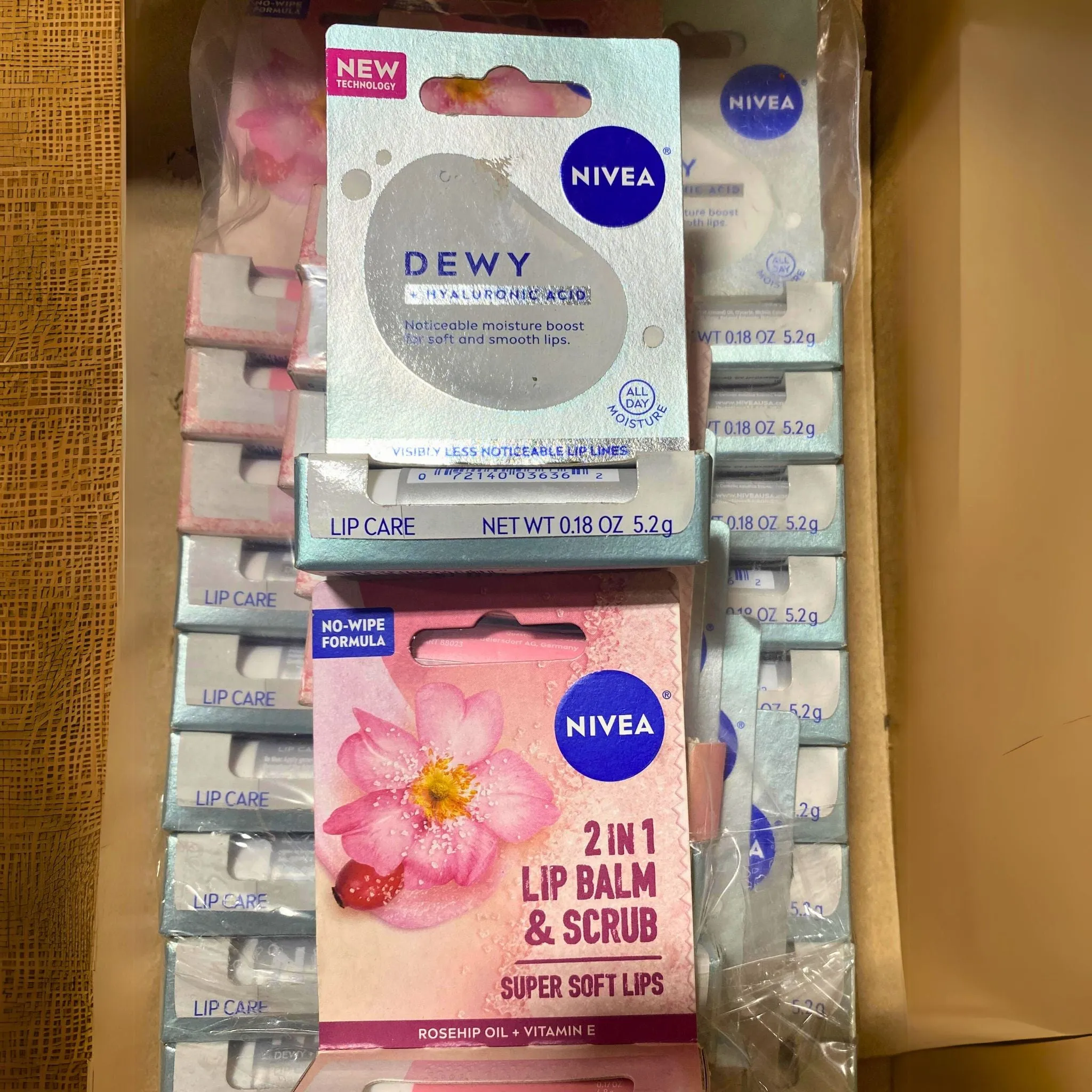 Nivea Dewy   Hyaluronic Acid Lip care 0.18 OZ & Nivea 2 in 1 Lip Balm & Scrub 0.17 OZ (50 Pcs Lot)